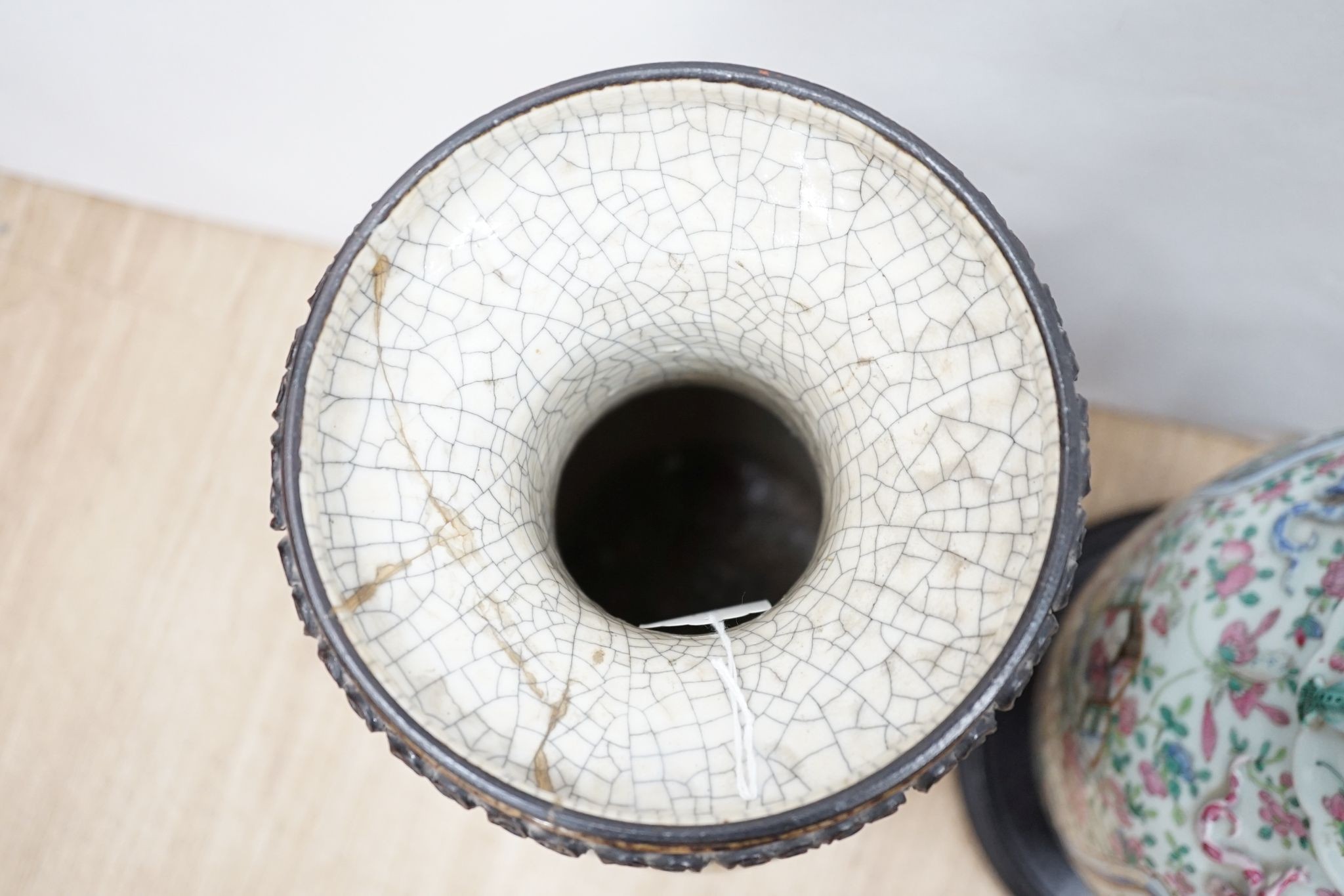 A large Chinese crackle glaze vase, late 19th/early 20th century and a large Chinese famille rose vase, late 19th century, tallest 60 cm.